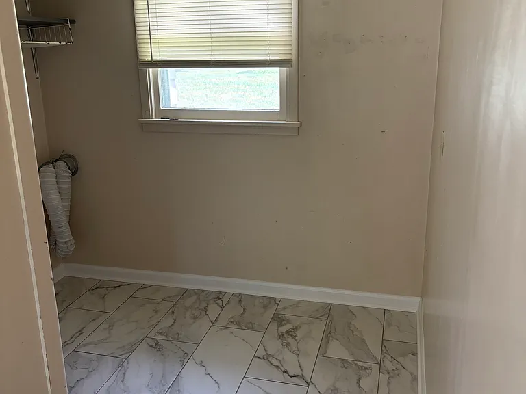 Utility room. To the left will be a new washer and dryer (installed 1-2 wks)