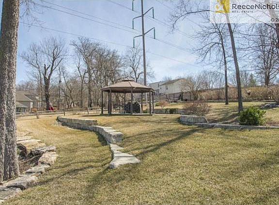 Gazebo with landscaped yard, great for parties and relaxing