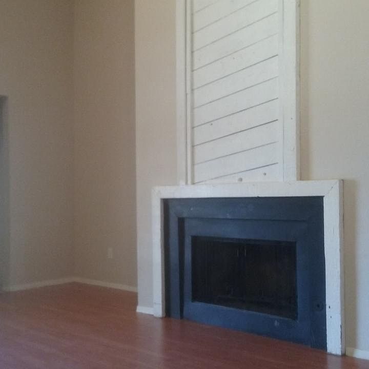 Vaulted ceilings in living room, with gas fireplace