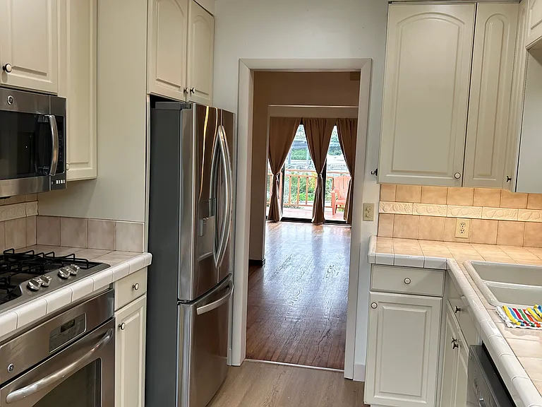 kitchen from backdoor to living room