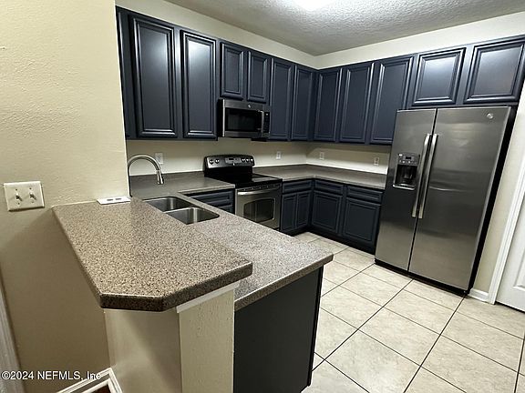 5th image of 8215 Green Parrot Rd Unit 102