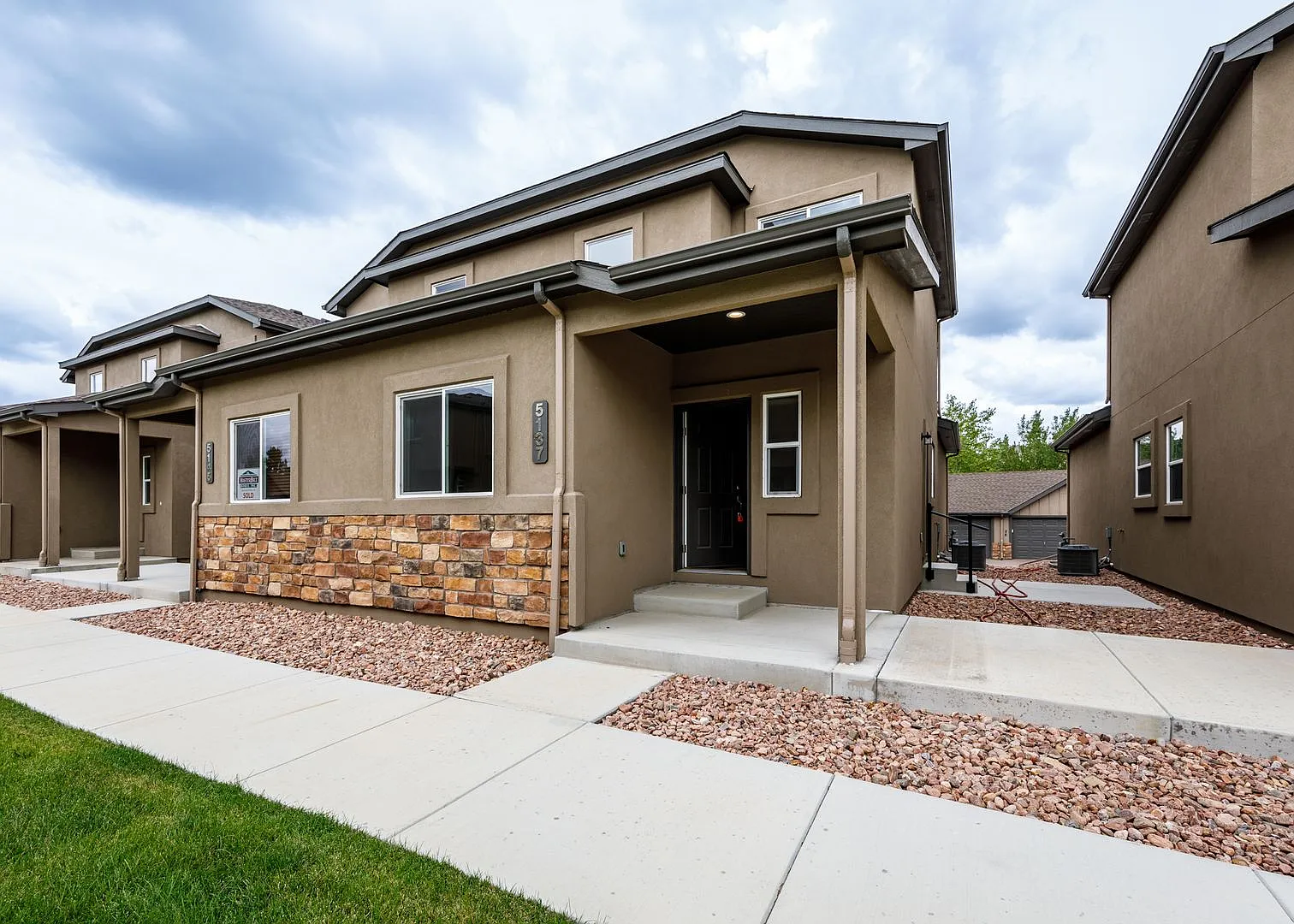 Brand-New 3BR/2.5BA Townhome with 1,100 Sq Ft Basement & 2 Garages in Palomino Ranch — Photo 1