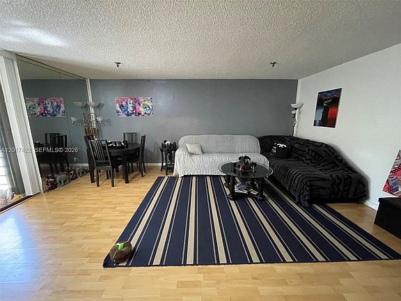 5th image of 671 NE 195th St APT 207