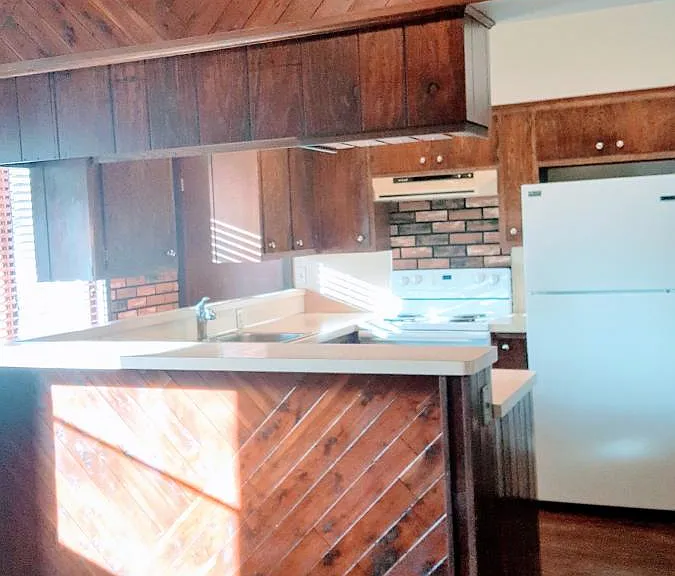 Looking into the kitchen from the dining area.