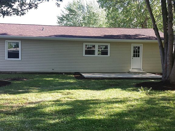 Back with concrete patio 