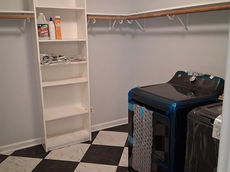 Spacious laundry room, with brand new GE Washer and Dryer