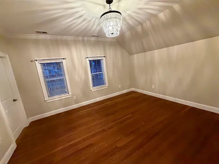Spacious third bedroom with walk in closet.
