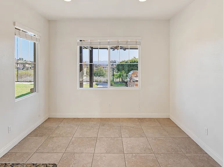 Informal Dinning Room by the Kitchen with backyard view