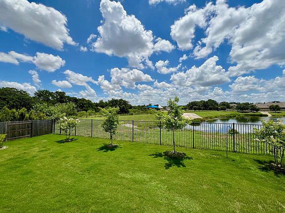 No rear neighbors and backs up to 7 miles of hike and bike trails, neighborhood park and pool