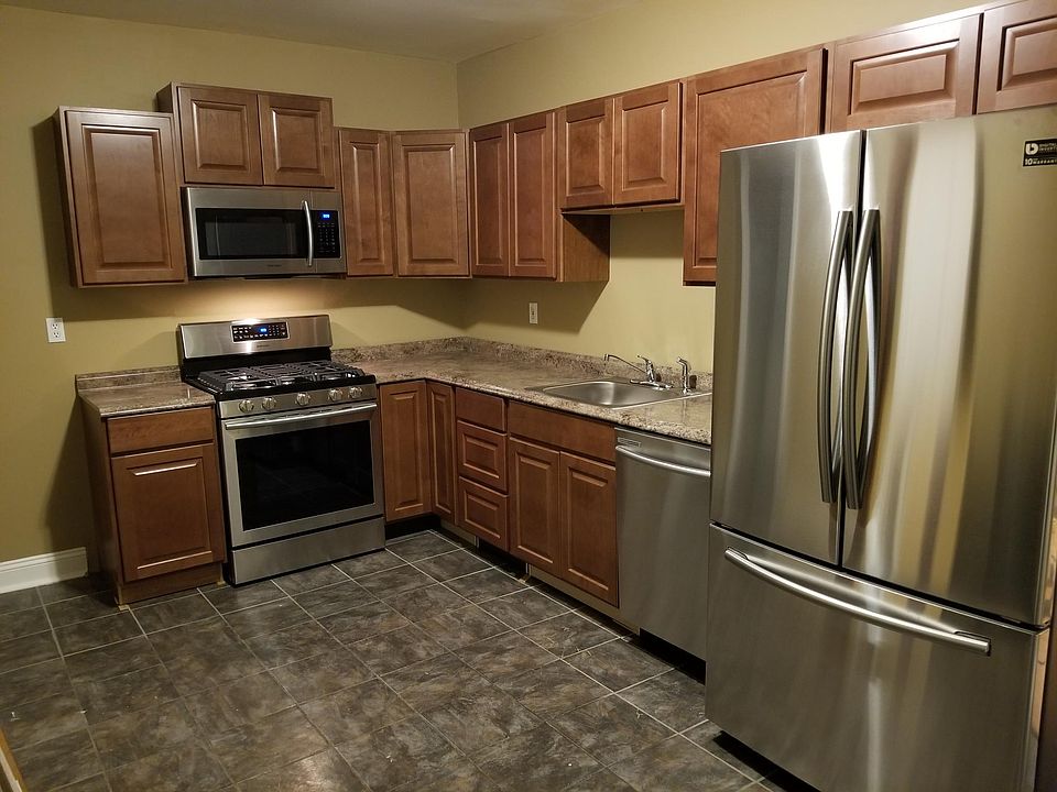 Kitchen includes all new cabinets, counter-tops, fixtures, microwave, stove, dishwasher, and refrigerator.