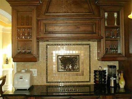 Gourmet kitchen with built in spice drawers, granite, stainless appliances
