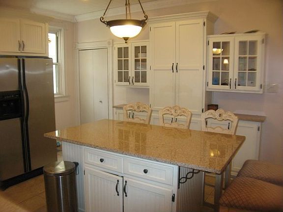 Additional Kitchen Features Include:  Granite Counters and Stainless Appliance