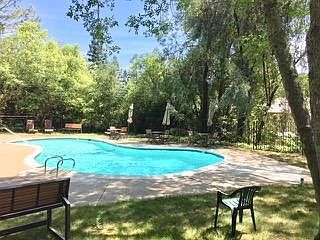 Pool and BBQ area just steps from front door.