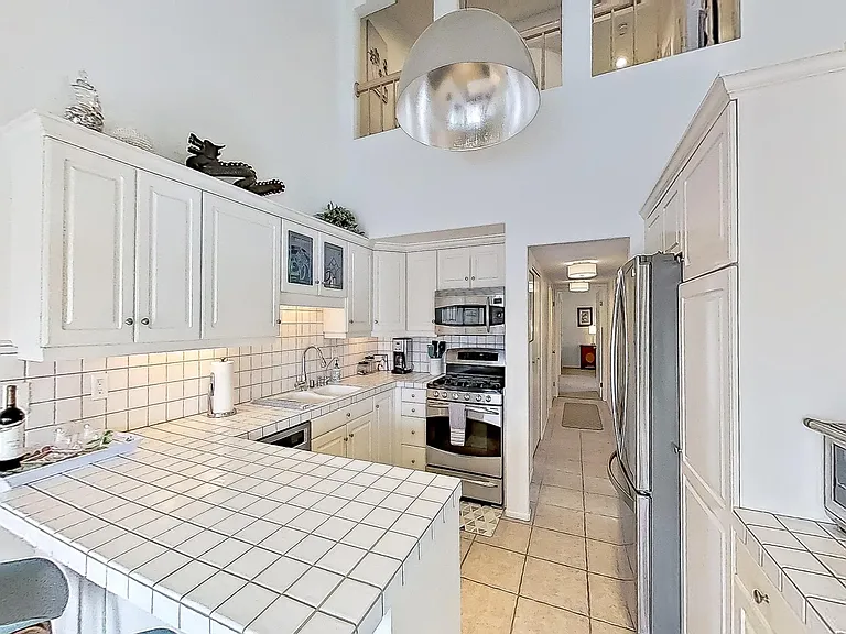 Coffee Pot, Toaster Oven, Electric Kettle, Blender provided.