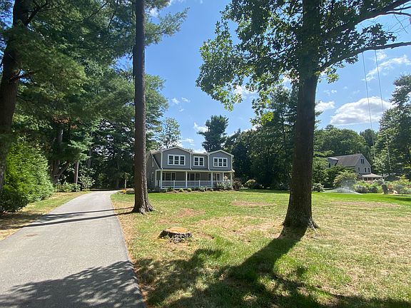Long driveway and large front yard