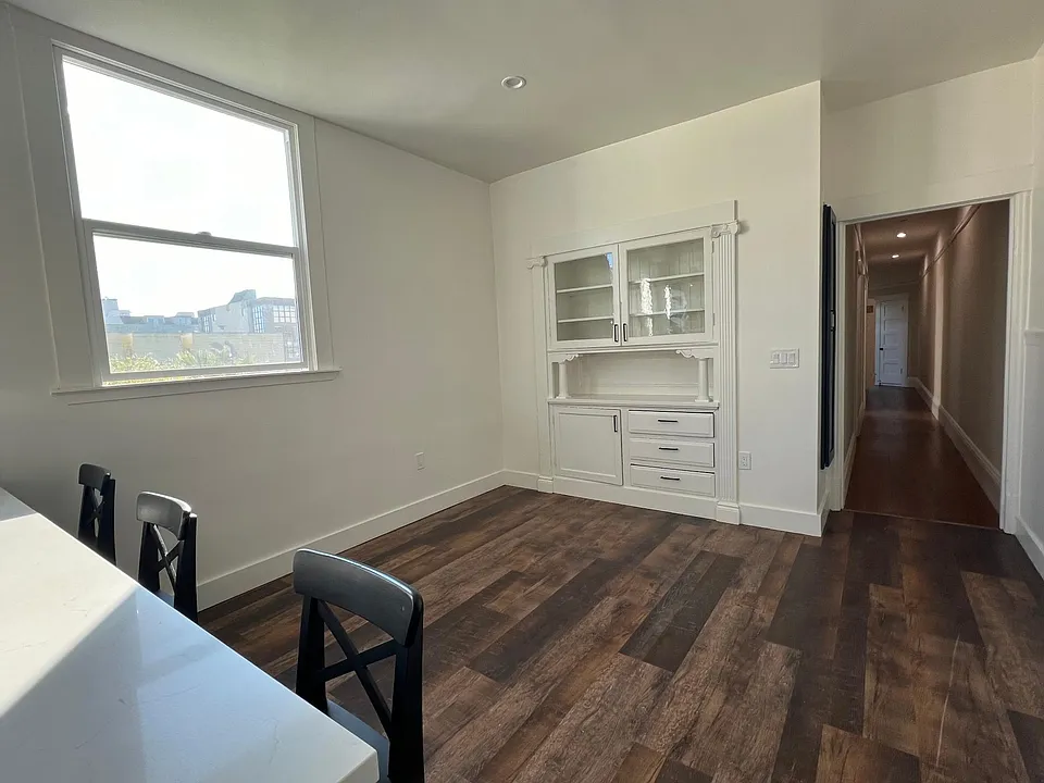 Original built in cabinet with plenty of space for table or couch