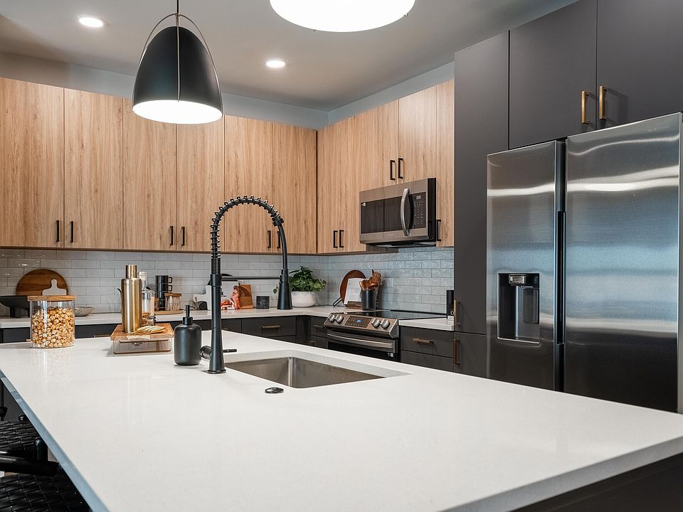A10 Kitchen with Quartz Countertops and Stainless Steel Appliances