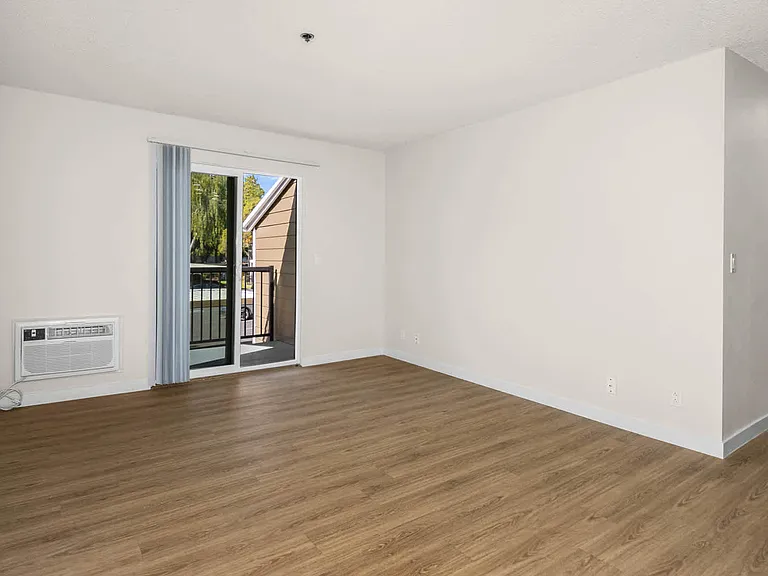 Living Room with Patio and Hard Surface Flooring