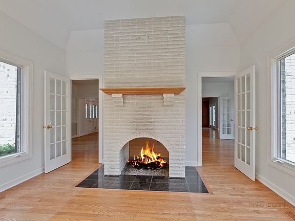Two-sided fireplace shared with living room