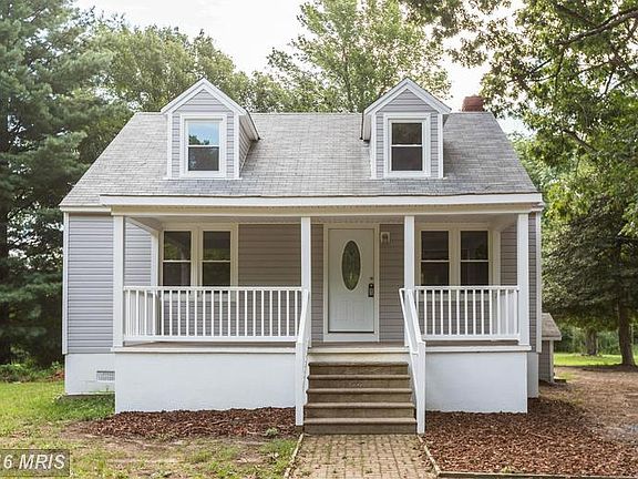 All new vinyl siding, windows, and porch railings.