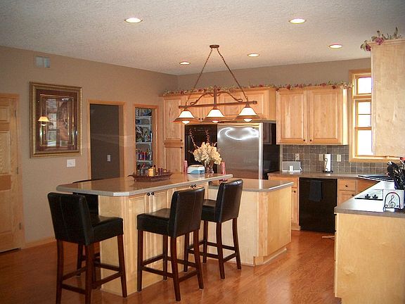 2nd image of 10936 Woodland Dr N