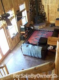 View from Loft : View from loft, built-in entertainment, Vermont Casting stove with stone mantle