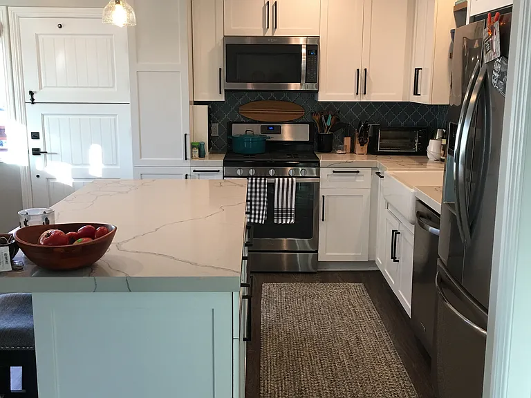 White shaker cabinetry with plenty of storage