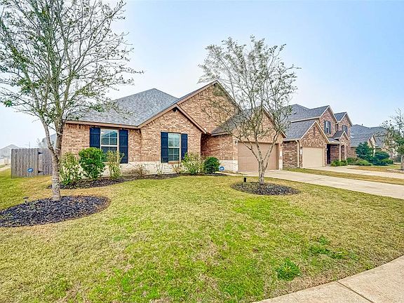 The home is situated on a desirable, large corner lot