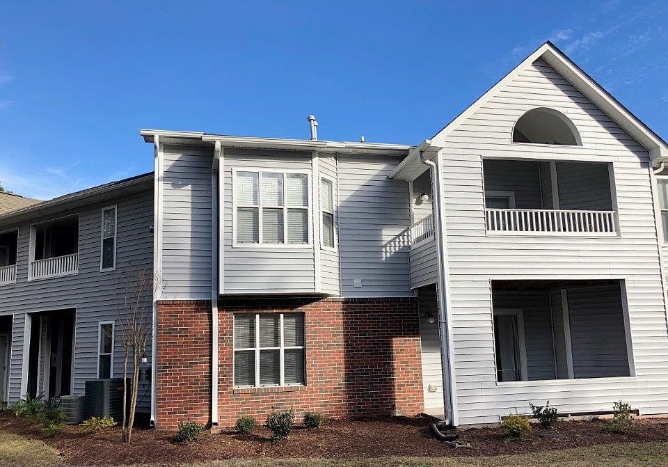 Unit, ground floor. Entrance at left, porch, at right