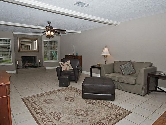 Open Family Room with Gas fireplace and desk area