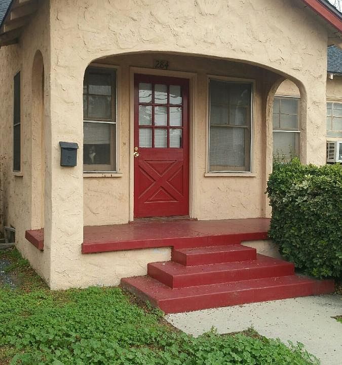 Front of apartment, private porch.