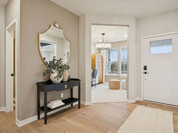 A welcoming foyer with beautiful finishes sets the tone for your home s style and charm.