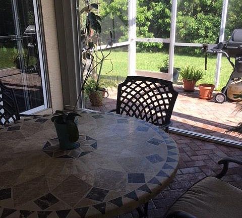 Screened in Back Patio Area