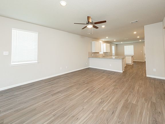 Family Room to Kitchen and Dining Area