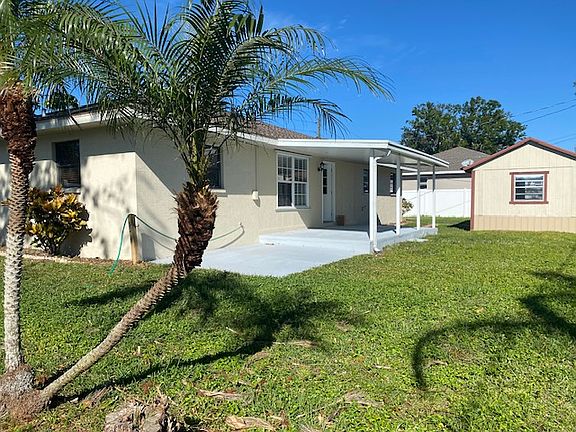 Large lot, fully fenced, with patio and large storage shed