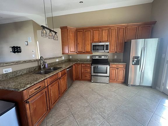 4th image of 9498 W Nichols Dr