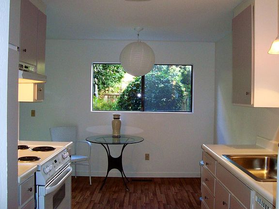 Kitchen , bright and sunny for morning and dining area.