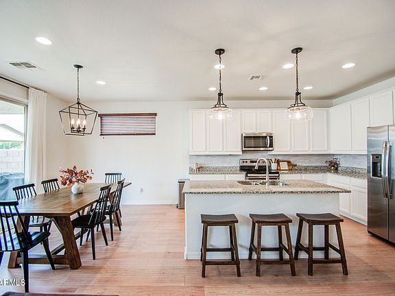 5th image of 9540 E Travertine Avenue