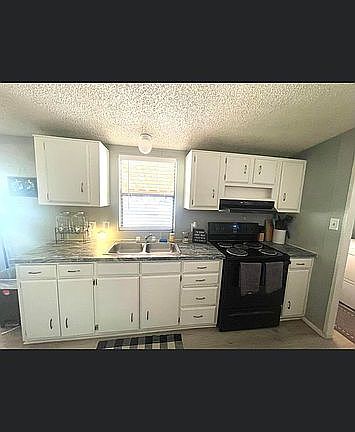 Freshly painted kitchen cabi