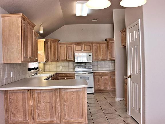 Kitchen area with pantry