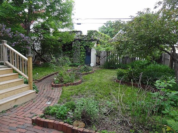 Newer Deck leads to lush perennial backyard gardens