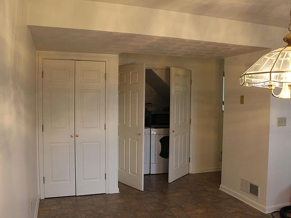 Dining area with pantry closet and washer/dryer closet
