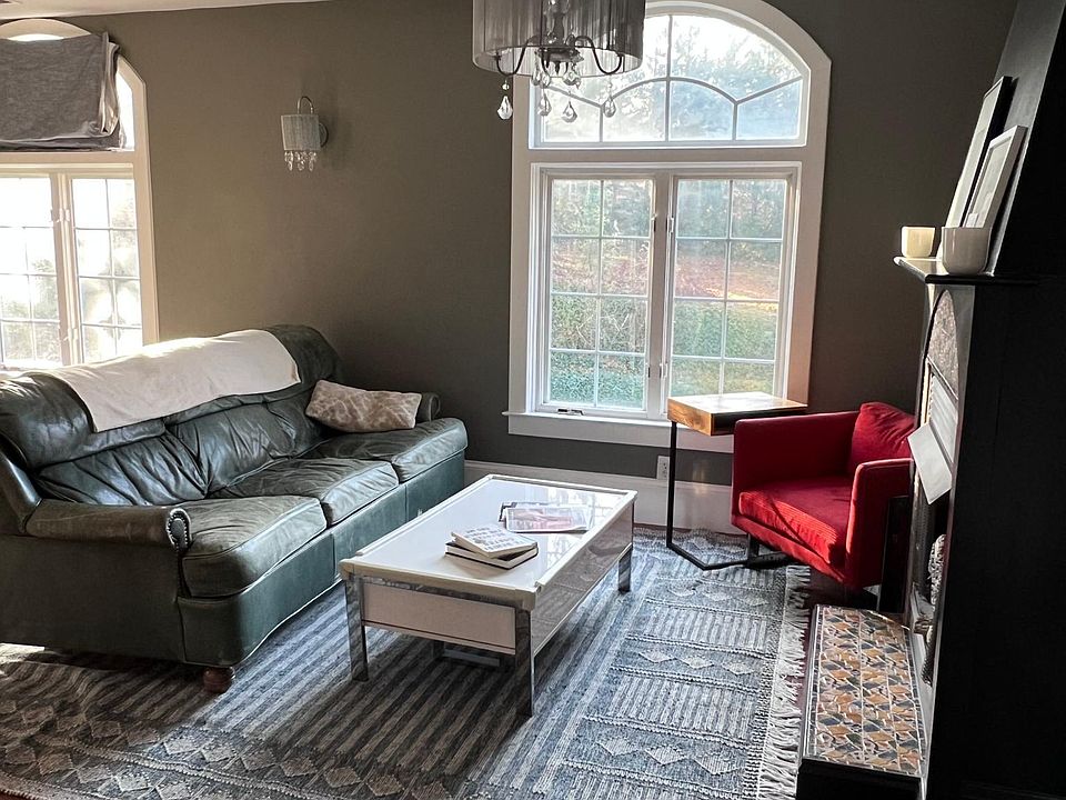 Furniture (not rug) included. Gas fireplace works and couch folds out.