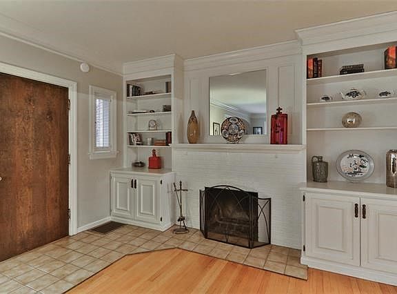 Wood burning fireplace and built-ins.