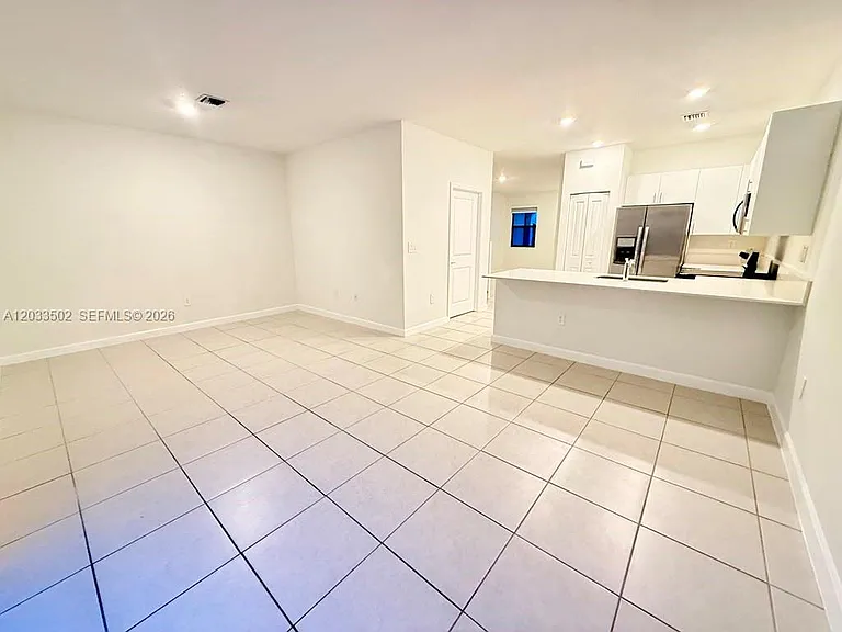 11910 SW 245th Ter #11910 — Photo 9