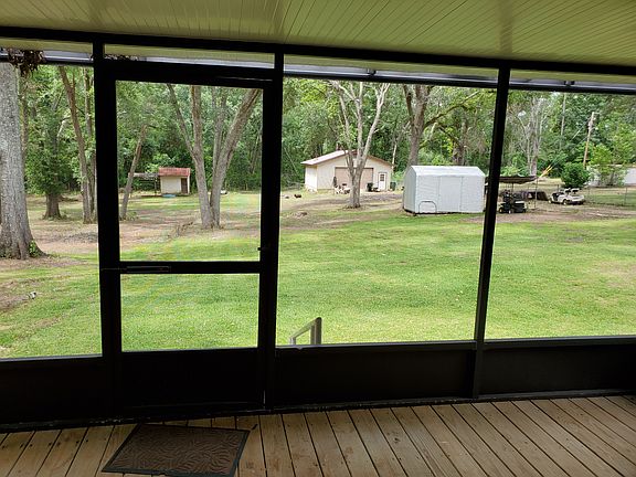 Acre back yard with shop