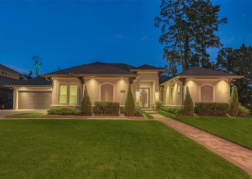 Tucked away on a private, oversized lot on a cul-de-sac street is 24702 Emerald Manor Lane! Welcome home!