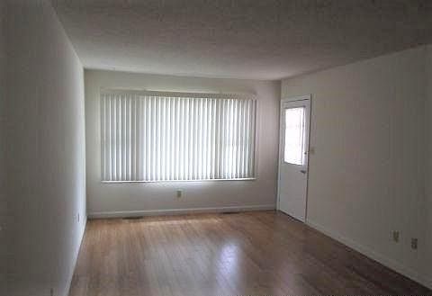 Living Room with plenty of sunlight!