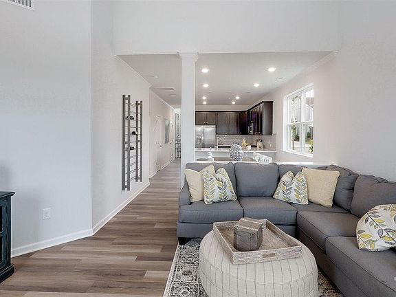 Front pictures of the model and for illustration only. The cabinets will be upgraded to white 42-inch cabinets and quartz countertop