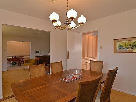 Formal dining room off living room with easy access to kitchen.